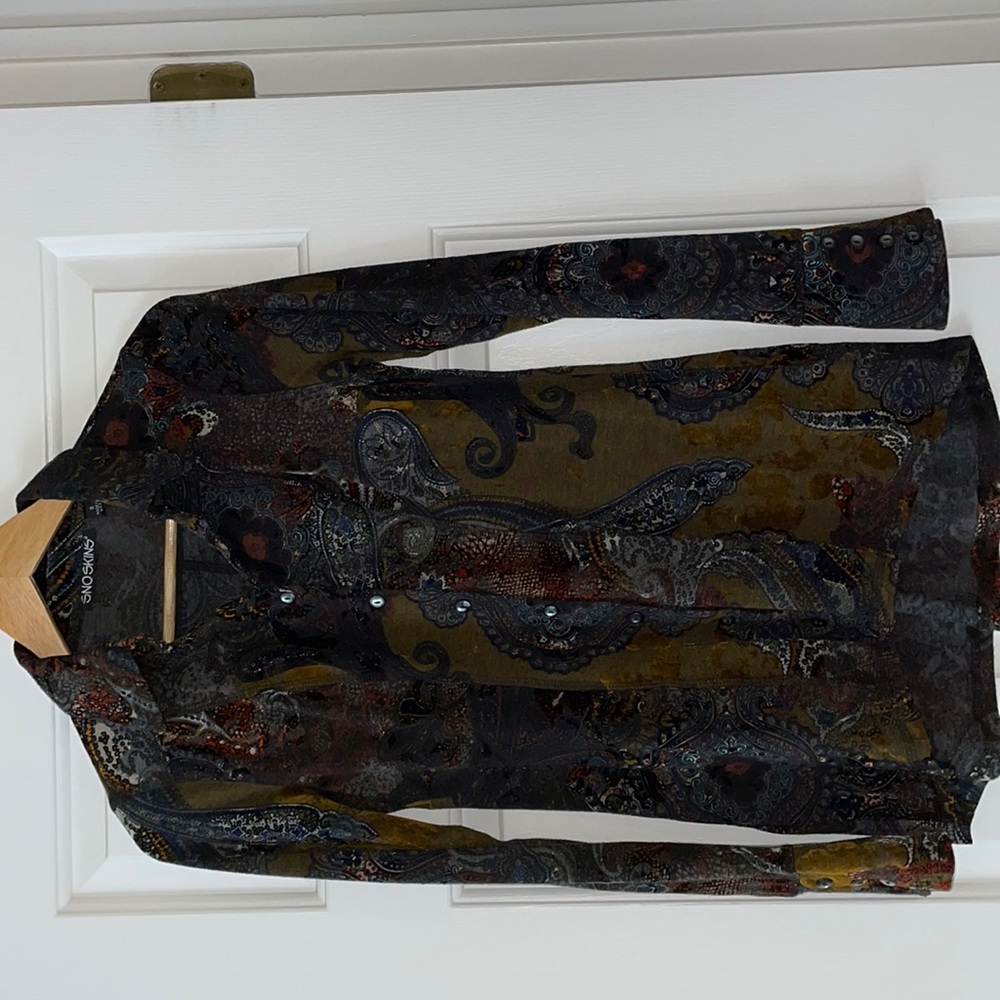 Made in USA.  French fabric in a multicolored embossed print wear.